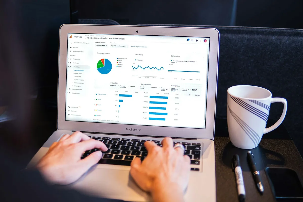 Business analyst reviewing charts and performance reports