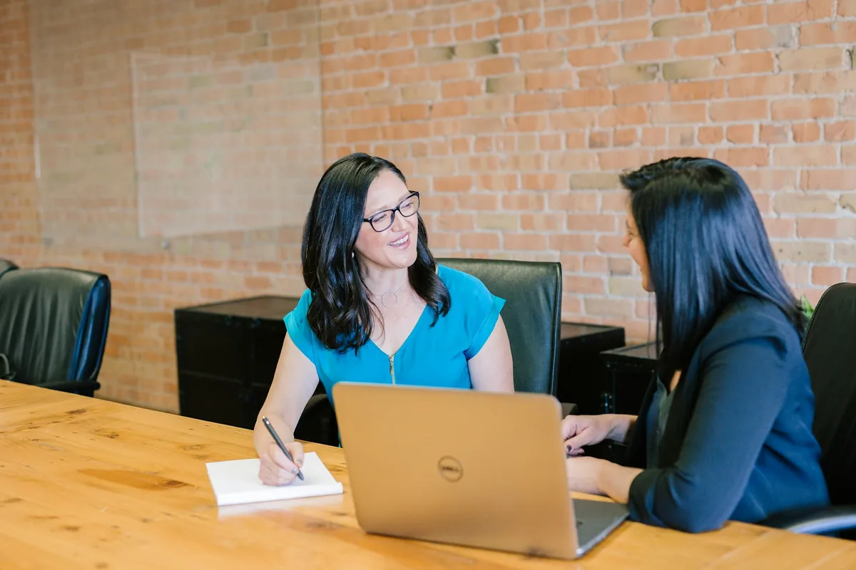 Professionals in a focused small business discussion
